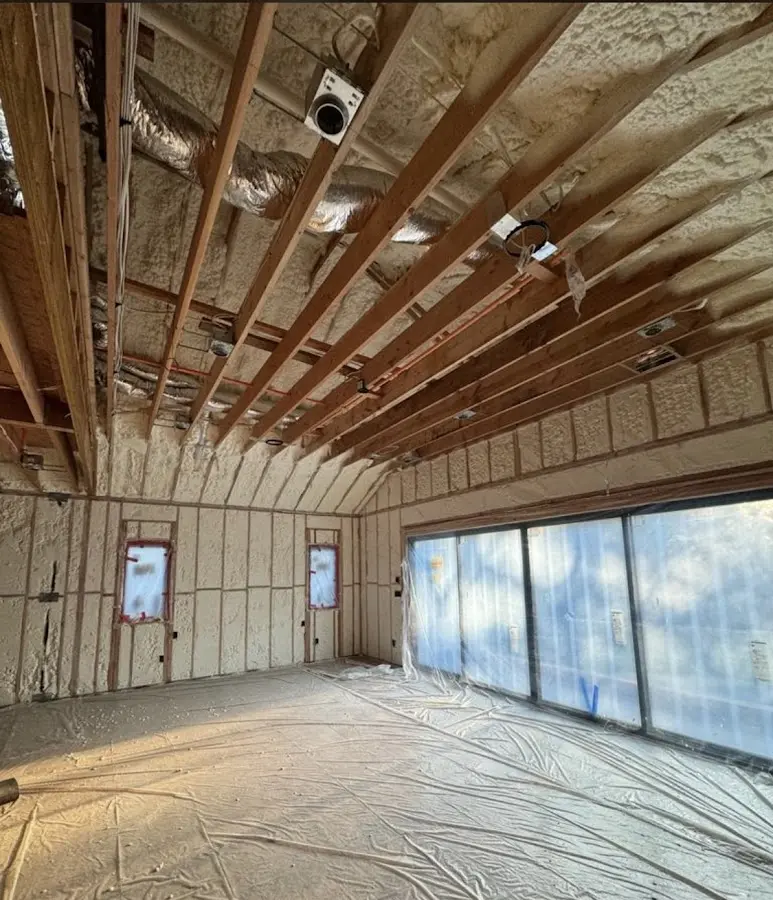 Interior walls and ceiling insulated with spray foam during new construction in Clovis